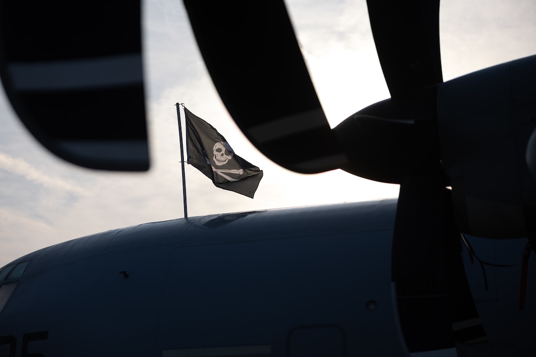 A U.S. Marine Corps KC-130J Super Hercules with Marine Aerial Refueler Transport Squadron (VMGR) 352, Marine Aircraft Group 11, 3rd Marine Aircraft Wing, displays the squadron flag during Exercise Sentry North at Volk Field Air National Guard Base, Wisconsin, June 4, 2025.