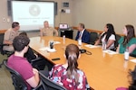 Naval Medical Research Unit San Antonio Commanding Officer, Capt. Michael Tiller, speaks with program management personnel from the Office of Naval Research’s Naval Research Enterprise Internship Program and Science and Engineering Apprenticeship Program, at the Battlefield Health and Trauma Research Institute. The NREIP/SEAP management team visited with NAMRU San Antonio to tour facilities and speak with student interns about the program.