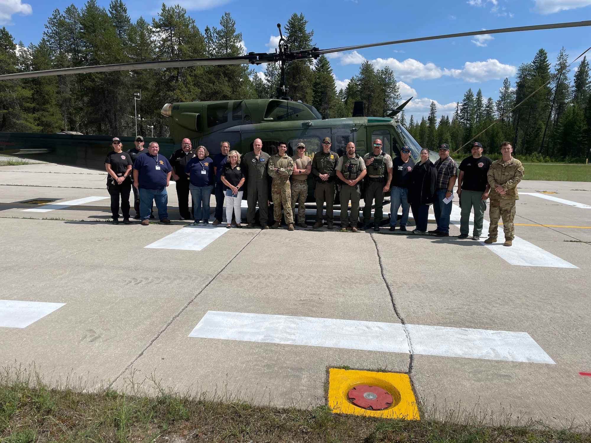 people in front of helicopter