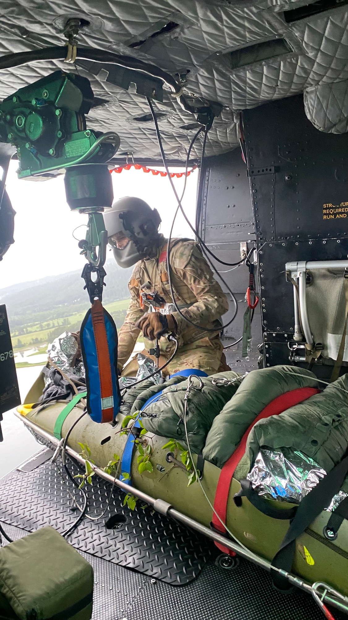 person in helicopter