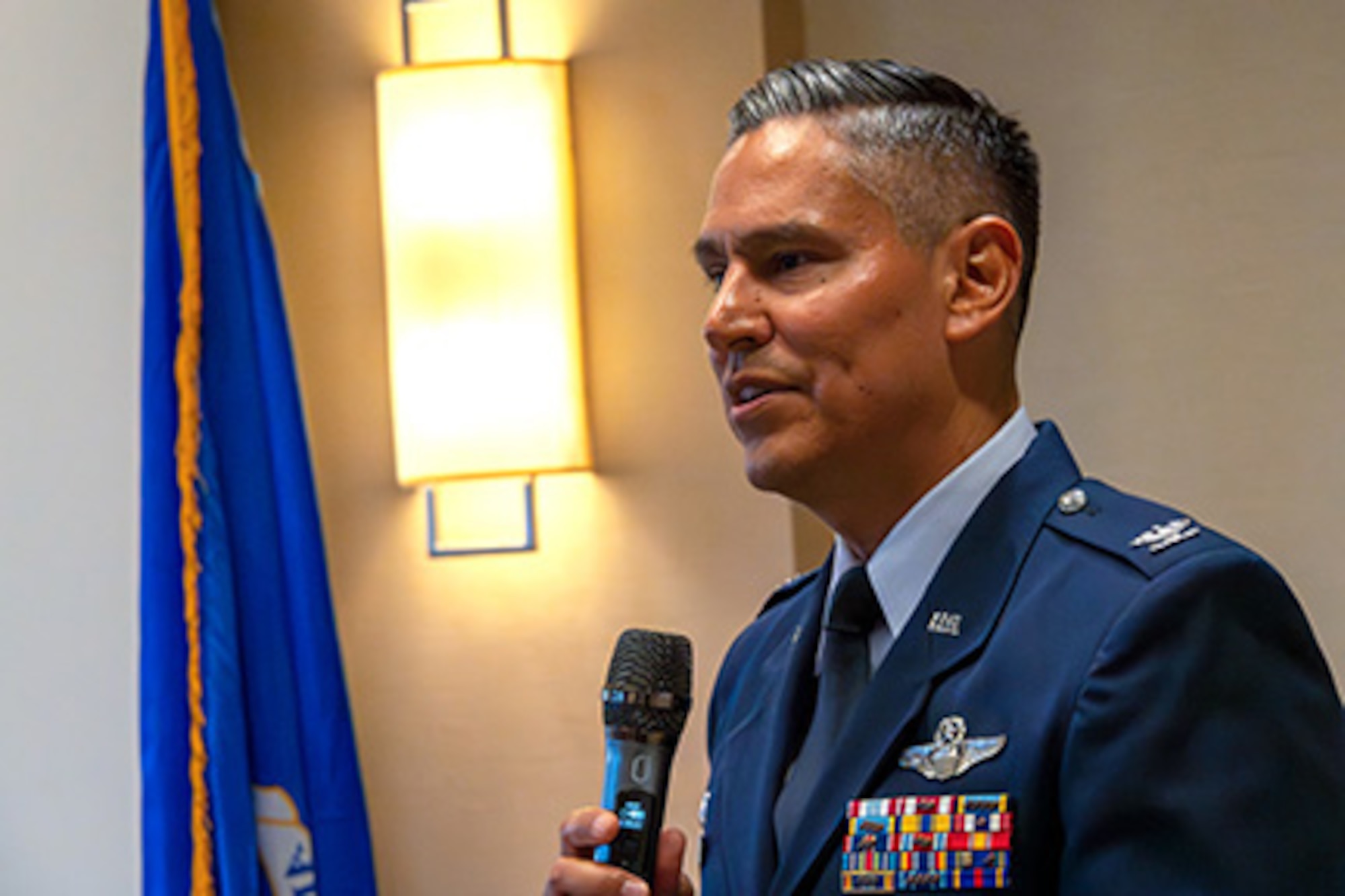 Colonel Martinez delivers a speech during the 307th Bombardment Group reunion dinner.