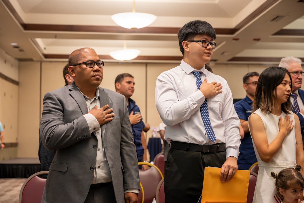 People recite pledge of allegiance