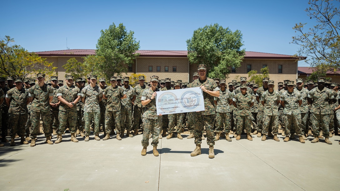 U.S. Marine Corps Lt. Gen. Michael S. Cederholm, right, the commanding general of I Marine
Expeditionary Force, recognizes Marines and Sailors with 7th Engineer Support Battalion, 1st Marine
Logistics Group, I MEF, for exceptional performance during Operation Clean Sweep II on Marine
Corps Base Camp Pendleton, California, July 1, 2025.