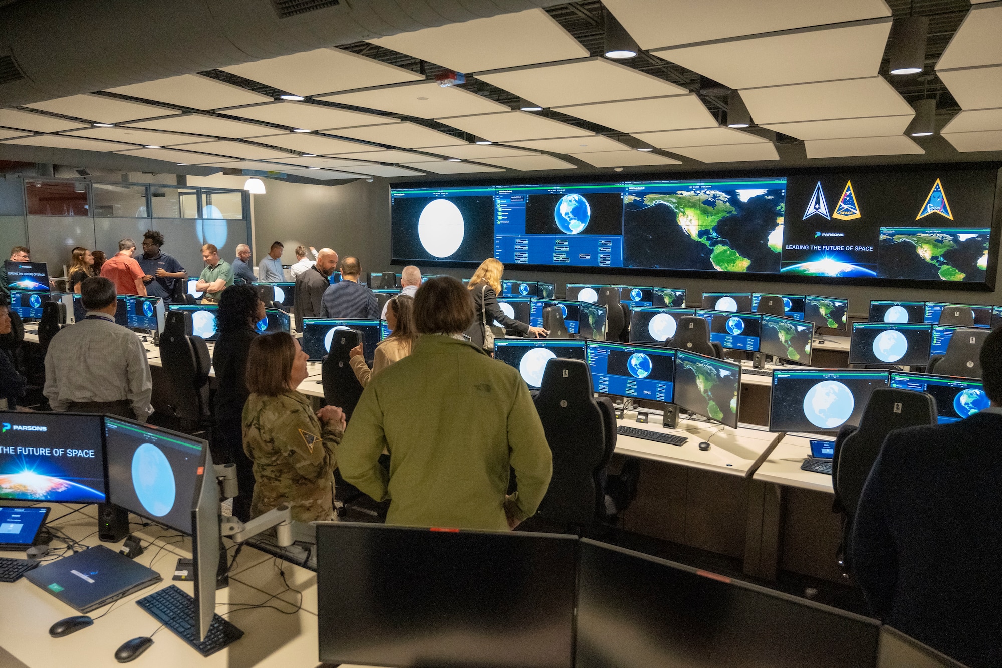 Members of the U.S. Space Force, contractors and mission partners tour the newly opened Medium Earth Orbit (MEO) Space Operations Center (MSOC) located at the Boulder Ground Innovation Facility (BGIF), Colo., May 28, 2025. The MSOC establishes a centralized hub for MEO operations, designed to manage the flow of data from space to ground, accelerate processing, and improve the delivery of critical missile warning and tracking information to military and allied decision-makers around the globe. (Courtesy photo)
