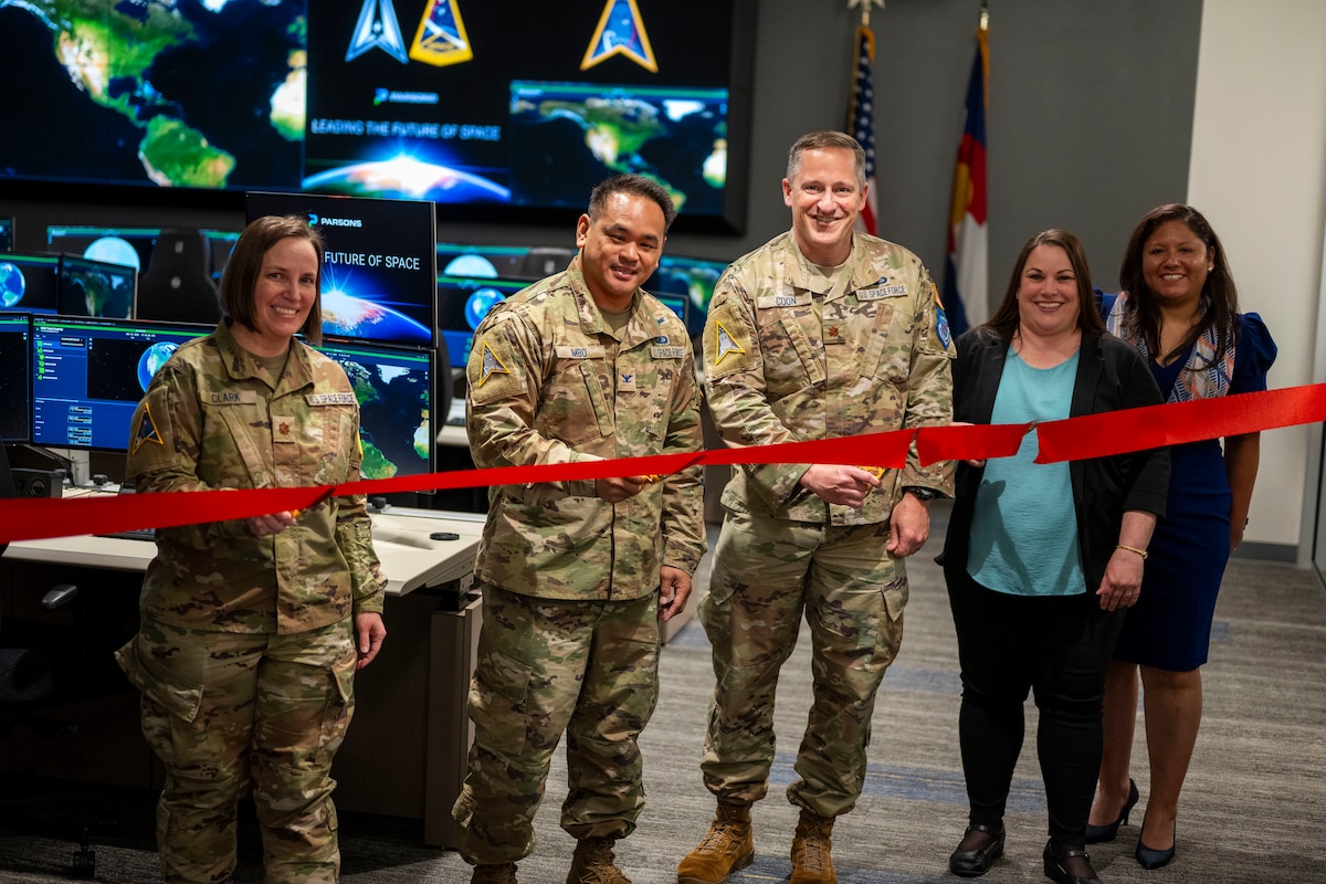 Left to Right) U.S. Air Force Maj. Keri Ana Clark, Strategic Missile Warning, Ground, and Integration (SNG) interim director of the Overhead Persistent Infrared (OPIR) Tools, Applications, and Processing (TAP) Lab and director of the Boulder Ground Innovation Facility (BGIF), U.S. Space Force Col. Raydon Imbo, Resilient Missile Warning/Missile Tracking (MW/MT) materiel leader, Maj. Cameron Coon U.S. Space Force Engineer, Ana Berland, Resilient MW/MT Medium Earth Orbit (MEO) chief engineer (Parsons), and Christine McCollum, Resilient MW/MT MEO program manager (Parsons), participate in a ribbon cutting ceremony for the Medium Earth Orbit (MEO) Space Operations Center (MSOC) located at the Boulder Ground Innovation Facility (BGIF), Colo., May 28, 2025. The MSOC establishes a centralized hub for MEO operations, designed to manage the flow of data from space to ground, accelerate processing, and improve the delivery of critical missile warning and tracking information to military and allied decision-makers around the globe. (Courtesy photo)