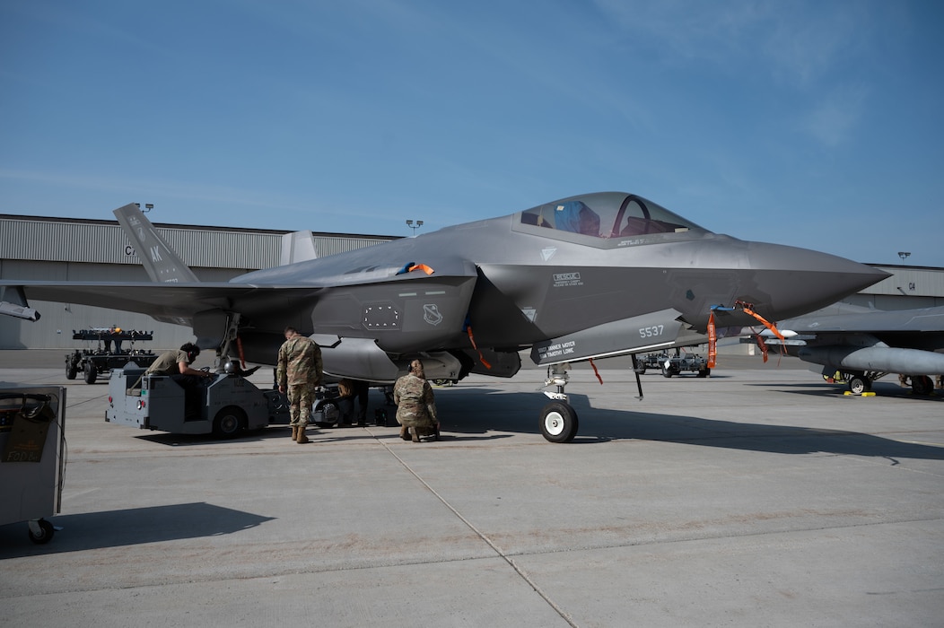 U.S. Air Force Airmen from the 355th Fighter Generation Squadron, prepare a F-35A Lightning II during the second quarter load competition at Eielson Air Force Base, Alaska, July 3, 2025.