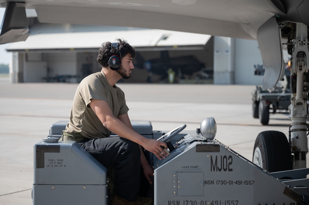 U.S. Air Force Airman 1st Class Michael Perez Macias, 355th Fighter Generation Squadron armament systems specialist, drives an MJ02 lift truck during the second quarter load competition at Eielson Air Force Base, Alaska, July 3, 2025.