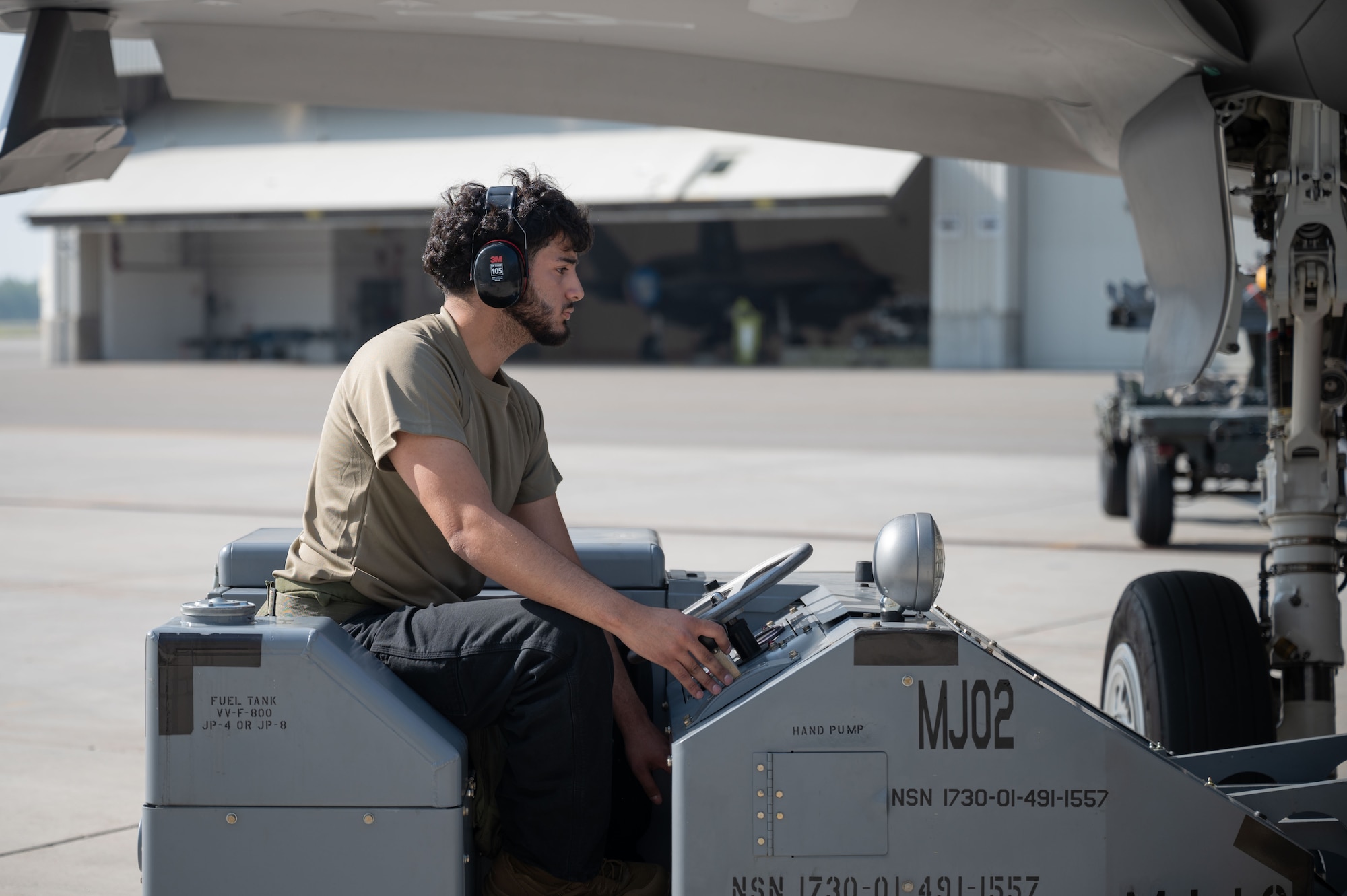 U.S. Air Force Airman 1st Class Michael Perez Macias, 355th Fighter Generation Squadron armament systems specialist, drives an MJ02 lift truck during the second quarter load competition at Eielson Air Force Base, Alaska, July 3, 2025.