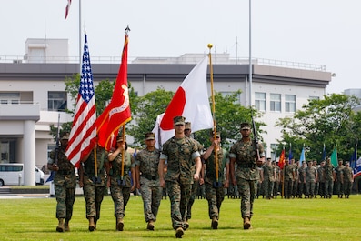 WAKUNI, YAMAGUCHI, Japan (July 2, 2025) — U.S. Marine Corps Lt. Col. Devon Tschirley, station executive officer, Marine Corps Air Station Iwakuni, marches with the color guard during a change of command ceremony at MCAS Iwakuni, Japan, July 2, 2025....