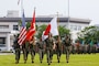U.S. Marine Corps Lt. Col. Devon Tschirley, station executive officer, Marine Corps Air Station Iwakuni, marches with the color guard during a change of command ceremony at MCAS Iwakuni, Japan, July 2, 2025.