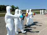 Airmen from the 168th Wing Medical Group, along with their counterparts from other Air National Guard units, conduct radiation monitoring during field training at Alpena Combat Readiness Training Center, Michigan, June 2025. The training enhances the unit’s ability to detect and respond to radiological threats in deployed or contingency environments.