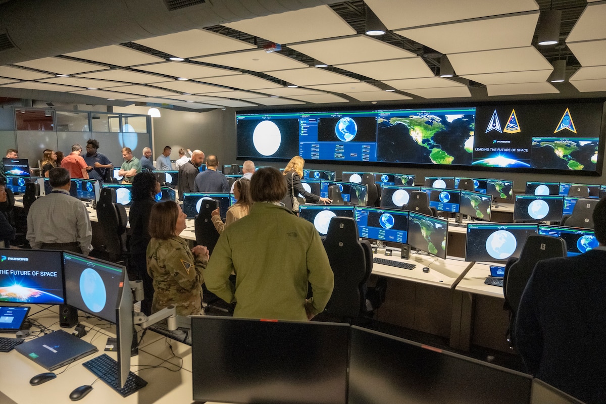 Members of the U.S. Space Force, contractors and mission partners tour the newly opened Medium Earth Orbit (MEO) Space Operations Center (MSOC) located at the Boulder Ground Innovation Facility (BGIF), Colo., May 28, 2025. The MSOC establishes a centralized hub for MEO operations, designed to manage the flow of data from space to ground, accelerate processing, and improve the delivery of critical missile warning and tracking information to military and allied decision-makers around the globe. (Courtesy photo)
