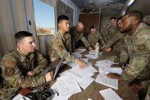 U.S. Airmen assigned to the 60th Contracting Squadron (CONS) and the 9th CONS came together for a bilateral contracting exercise at Travis Air Force Base, California, on June 27, 2025.