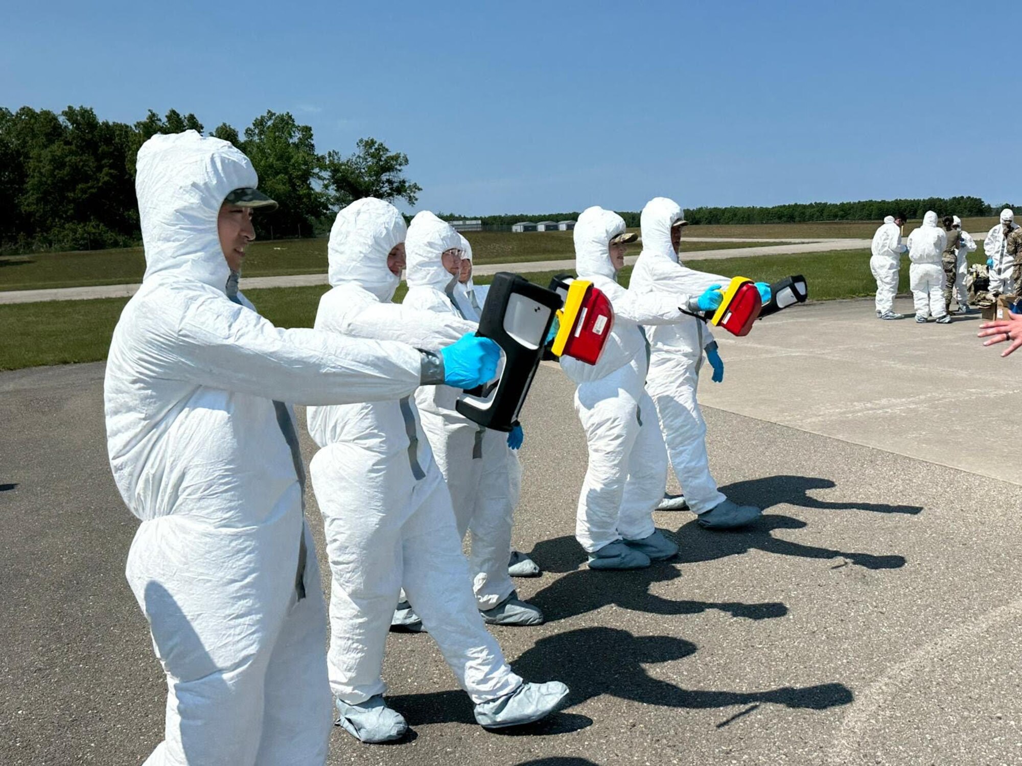Airmen from the 168th Wing Medical Group, along with their counterparts from other Air National Guard units, conduct radiation monitoring during field training at Alpena Combat Readiness Training Center, Michigan