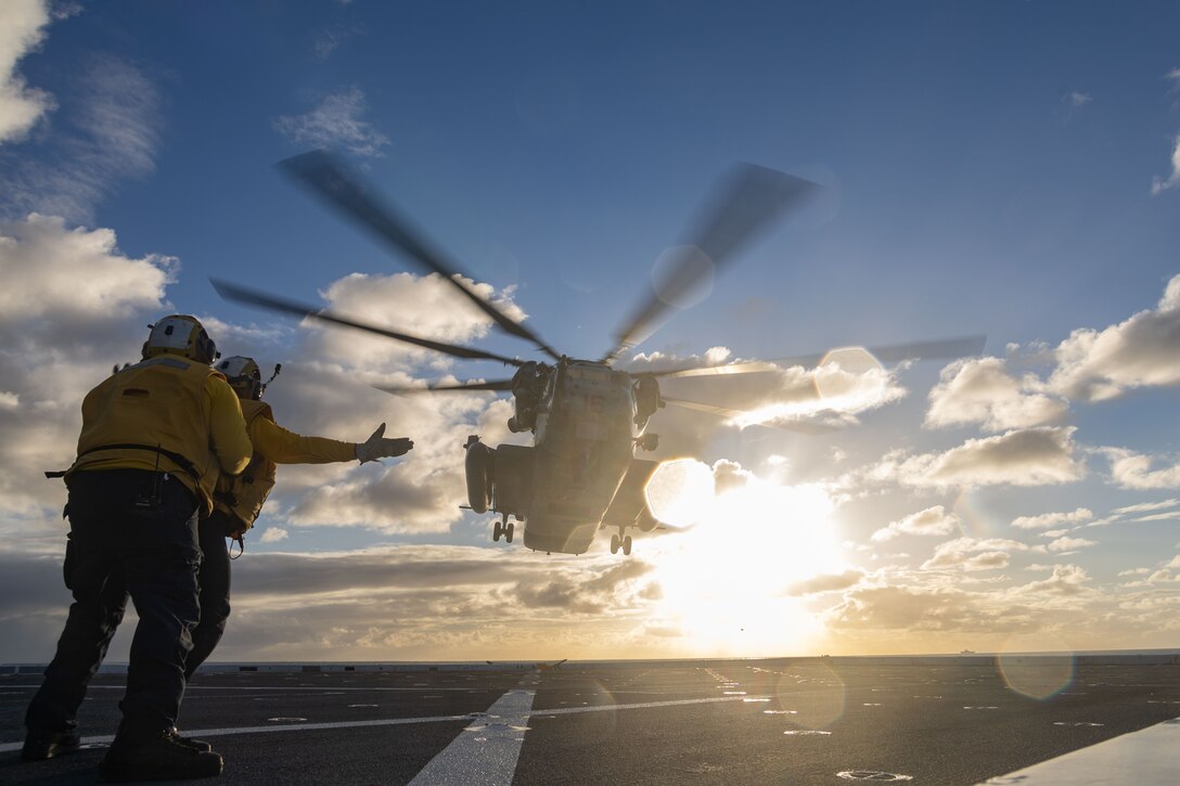 A U.S. Marine Corps CH-53E Super Stallion assigned to Marine Medium Tiltrotor Squadron (VMM) 265 (Rein.), 31st Marine Expeditionary Unit, takes off during flight operations aboard amphibious transport dock USS San Diego (LPD 22), in the Coral Sea, June 28, 2025. Marines and Sailors conducted flight operations in order to expand mission capabilities in support of the 31st MEU. The 31st MEU is operating aboard ships of the USS America Amphibious Ready Group in the 7th Fleet area of operations, the U.S. Navy’s largest forward-deployed numbered fleet, and routinely interacts and operates with allies and partners in preserving a free and open Indo-Pacific region. (U.S. Marine Corps photo by Lance Cpl. Trevor BishopWilliams)