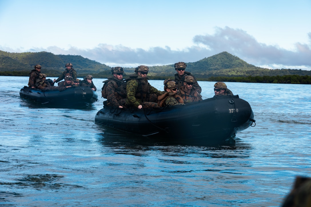 U.S. Marines with Baker Company, Battalion Landing Team 1st Battalion, 7th Marine Regiment, 31st Marine Expeditionary Unit, conduct ship-to-shore movement, utilizing the Enhanced Combat Rubber Reconnaissance Craft, in the Coral Sea, June 29, 2025. Marines conducted the ship to shore movement in order to improve amphibious raid capabilities and sustain small boat skills. The 31st MEU is operating aboard ships of the USS America Amphibious Ready Group in the 7th Fleet area of operations, the U.S. Navy’s largest forward-deployed numbered fleet, and routinely interacts and operates with allies and partners in preserving a free and open Indo-Pacific region. (U.S. Marine Corps photo by Lance Cpl. Trevor BishopWilliams)
