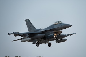 A U.S. Air Force F-16C Fighting Falcon assigned to the 555th Expeditionary Fighter Squadron prepares to land.