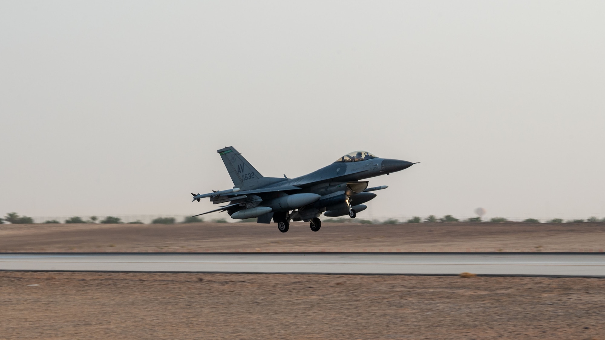 A U.S. Air Force F-16C Fighting Falcon assigned to the 555th Expeditionary Fighter Squadron prepares to land.