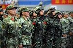 Chinese PLA (People's Liberation Army) soldiers stand in formation attending the 100-day countdown launch event for the Group of 20 (G20) 2016 summit in Hangzhou city, east China's Zhejiang province.