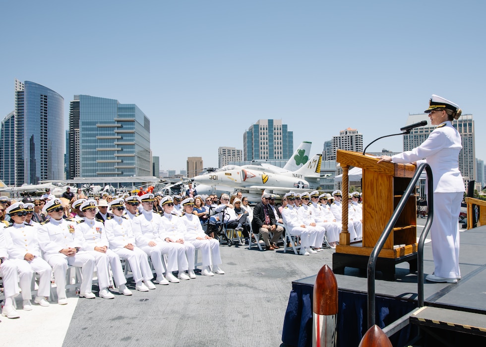 SAN DIEGO (June 25, 2025) – U.S. Navy Rear Adm. Pamela Miller, Medical Officer of the Marine Corps and Vice Chief of the Bureau of Medicine and Surgery for Reserve Policy and Integration, delivers keynote remarks aboard the USS Midway Museum during Naval Medical Center San Diego’s Emergency Medicine Residency Program graduation ceremony. Miller praised the graduating residents for their vital role in medical force generation. Naval Medical Center San Diego employs more than 5,000 active-duty military personnel, civilians, and contractors in Southern California to deliver exceptional care afloat and ashore.