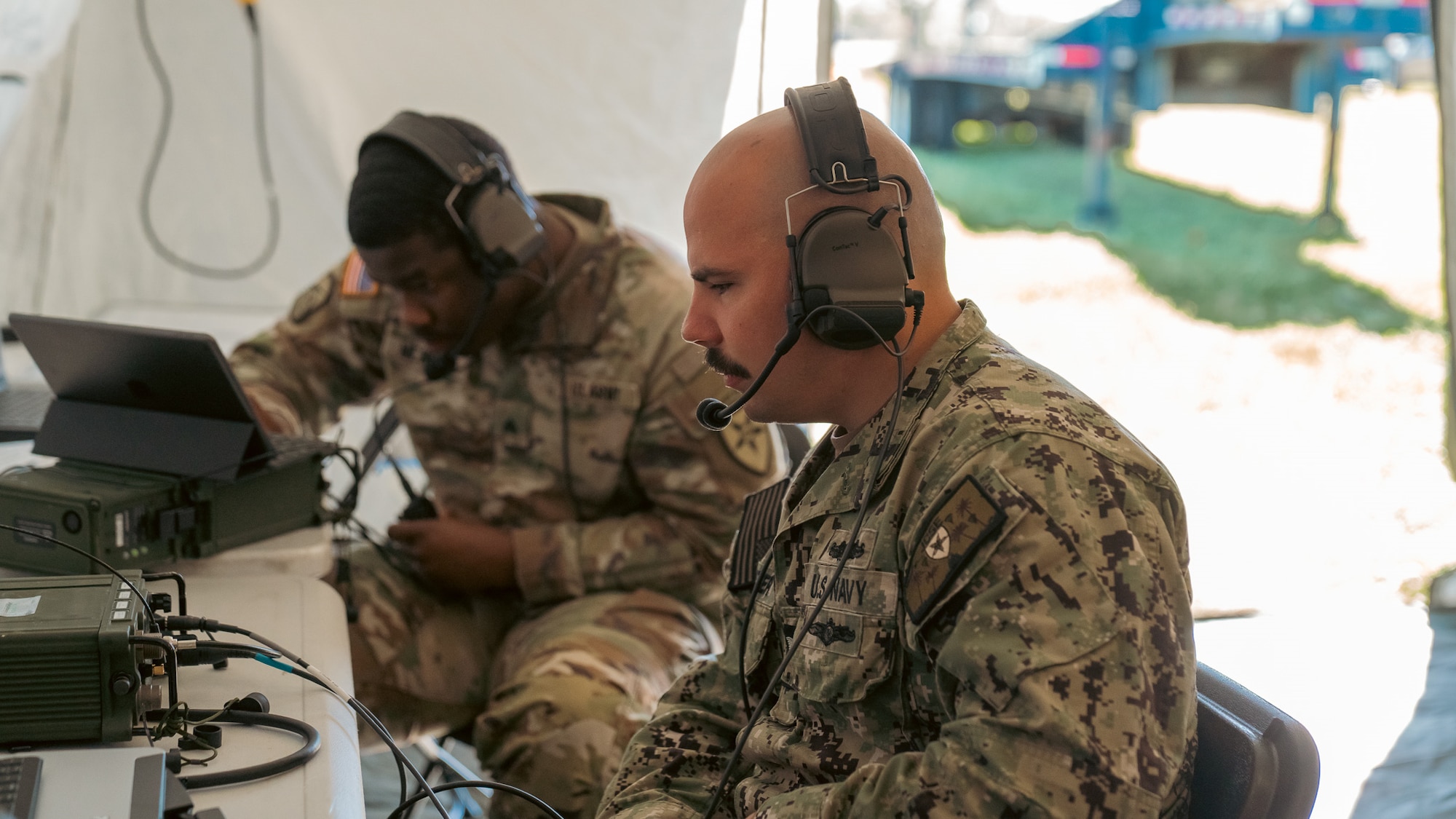 U.S. Navy Information Systems Technician Petty Officer 2nd Class Alex Coutler, 2nd Joint Communications Squadron, monitors fixed frequency radio channels for other competitors during the annual U.S. Army Network Enterprise Technology Command, open-source software defined radio High Frequency Radio Competition, from March 20-22, 2025, at MacDill Air Force Base, Florida. JCSE is a unit within the Department of Defense that provides quick response deployable teams, specializing in communication to support various missions. (U.S. Army photo)