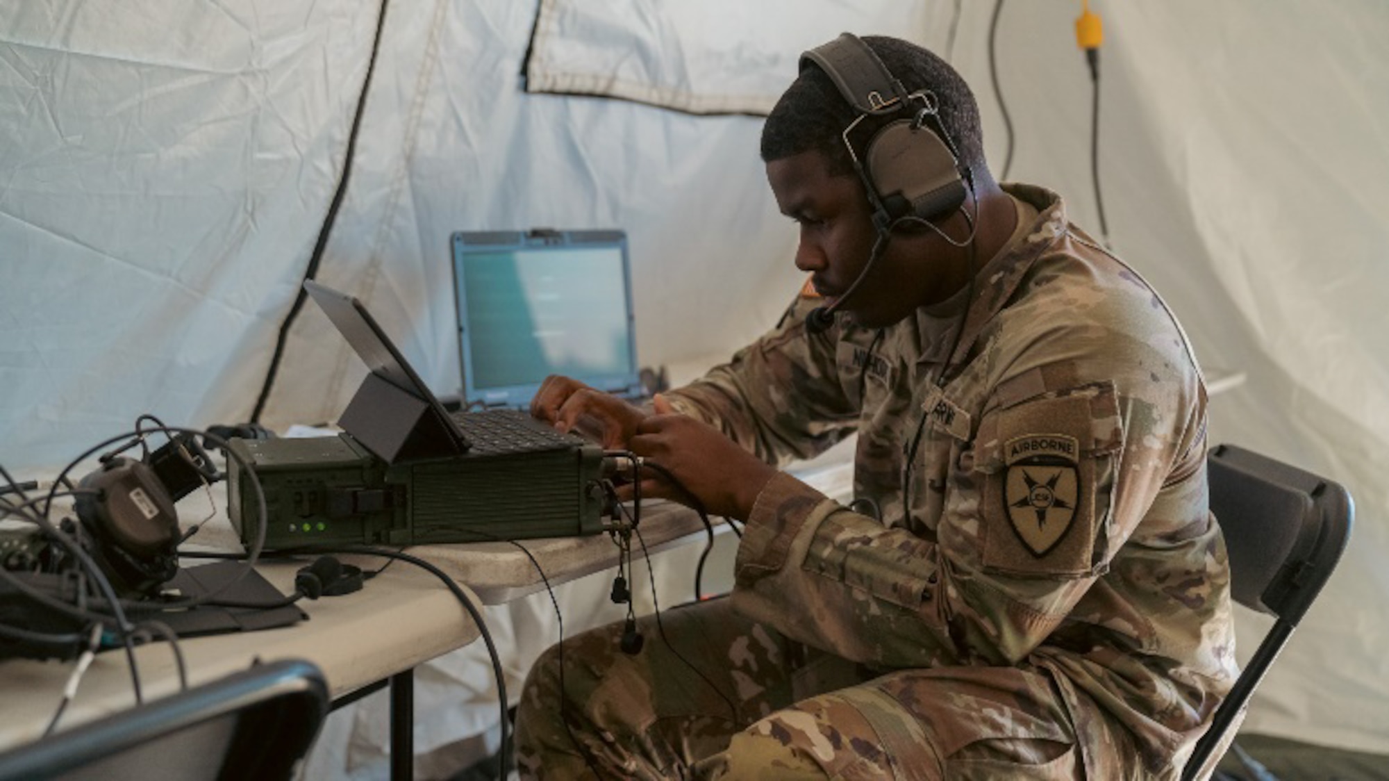 U.S. Army Sgt. Zameir Nicholas, 2nd Joint Communications Squadron Element joint communications systems technician, makes a 3rd generation automatic link establishment (3G ALE) call to a station  in 29 Palms, California, during the Annual United States Army Network Enterprise Technology Command, open-source software defined radio High Frequency Radio Competition, from March 20-22, 2025, at MacDill Air Force Base, Florida.. The JCSE is a unit within the Department of Defense that provides quick response deployable teams, specializing in communication to support various missions. (U.S. Army photo)