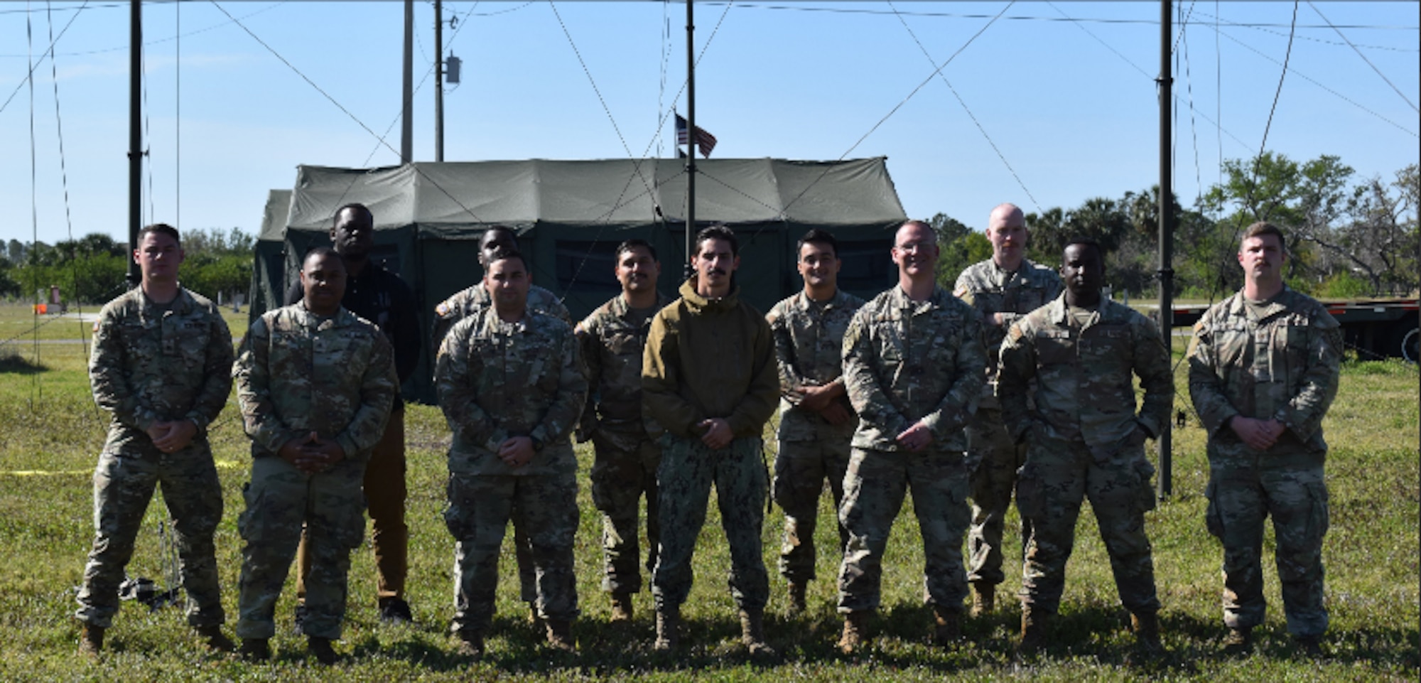 U.S. Service members from the 2nd Joint Communications Squadron Element (JCSE) joint communications systems technicians, pose for a photo following the Annual United States Army Network Enterprise Technology Command (NETCOM), open-source software defined radio (QPRX) High Frequency (HF) Radio Competition,  on March 20-22, 2025, at MacDill Air Force Base, Florida. NETCOM QPRX HF 2025 Competition is a low power (20 Watts) competition sticking to a contest-based format with points awarded for achieving various criteria. JCSE is a unit within the Department of Defense that provides quick response deployable teams, specializing in communication to support various missions. (U.S. Army photo)