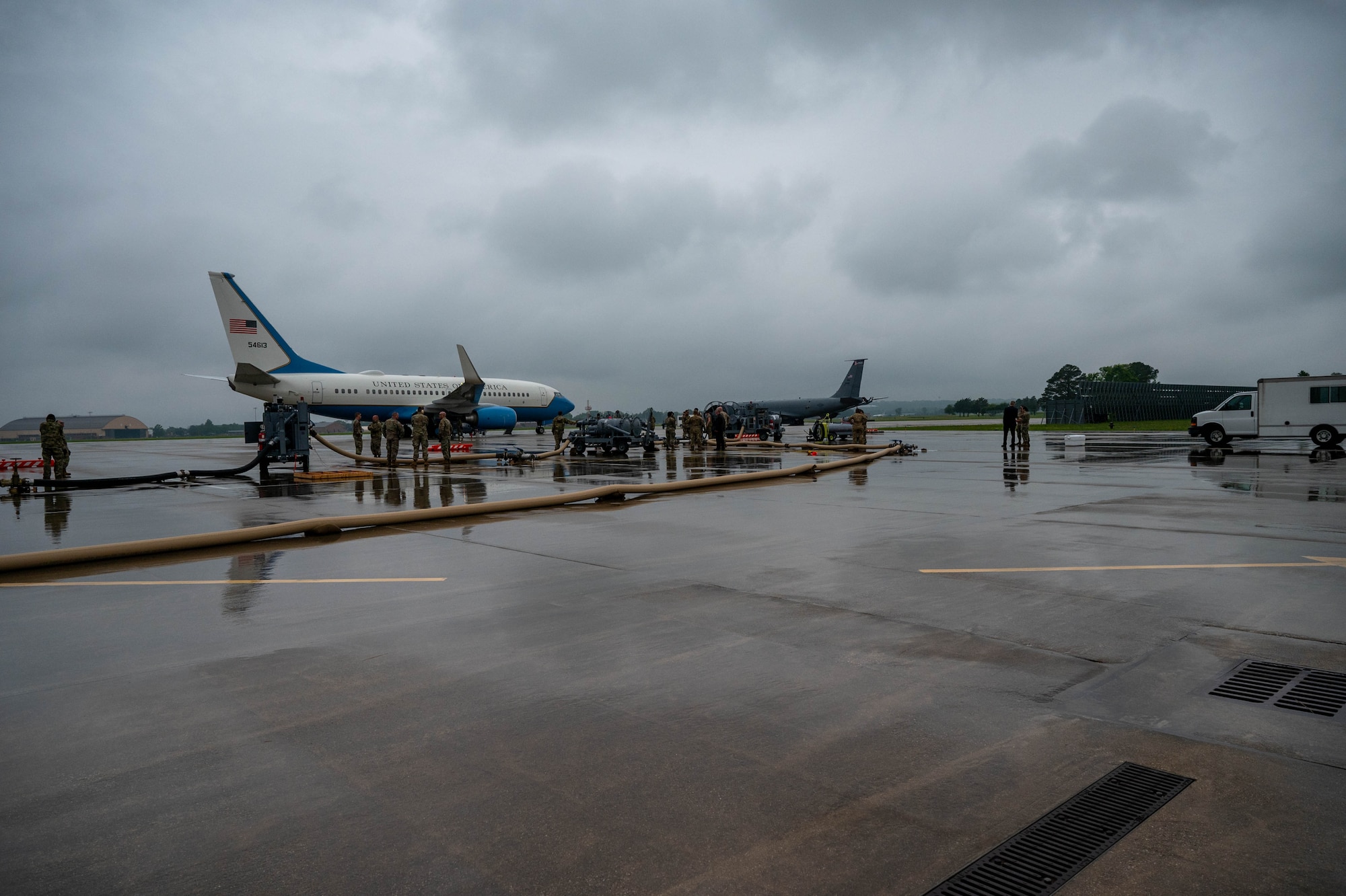 932nd Maintenance Group crew chiefs and the 375th Logistics Readiness Squadron personnel collaborate on the flight line to refuel a C-40C Clipper aircraft during the Quartermaster Liquid Logistics Exercise (QLLEX) at Scott Air Force Base, Illinois, June 6, 2025. The QLLEX focused on giving Airmen valuable joint operations refueling training with active duty Air Force, U.S. Army Reserve, and Air National Guard personnel and resources. (U.S. Air Force photo by Tech. Sgt. Kari Siltz)