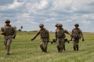 This week kicks off the 1st Infantry Division's Best Squad Competition, May 27-30, 2025, on Fort Riley, KS. The M4 stress shoot involved completing strenuous physical squad-based tasks, while ensuring targets could still be hit downrange. (U.S. Army photos by Sgt. Tyler Selige)