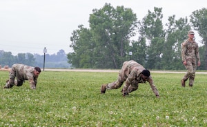 FORT RILEY, Kan. – Soldiers take part in the Best Squad Competition at Fort Riley on May 28, 2025. The event began with a physical training test that included a log carry, deadlifts, a run and a sled drag, designed to assess participants' strength, endurance and teamwork.(U.S. Army photos by Spc. Autumn Johnson)