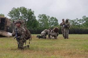 This week kicks off the 1st Infantry Division's Best Squad Competition, May 27-30, 2025, on Fort Riley, KS. Squads performed tactical combat casualty care after encountering a friendly casualty while on patrol. (U.S. Army photos by Sgt. Tyler Selige)