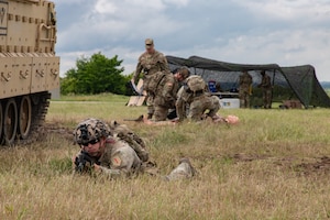 This week kicks off the 1st Infantry Division's Best Squad Competition, May 27-30, 2025, on Fort Riley, KS. Squads performed tactical combat casualty care after encountering a friendly casualty while on patrol. (U.S. Army photos by Sgt. Tyler Selige)