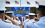 U.S. Navy and Royal Thai Navy leaders salute a formation of U.S. and Thai service members during the opening ceremony of exercise Cooperation Afloat Readiness and Training (CARAT) at Sattahip Naval Base, Thailand, July 7, 2025. The 31st iteration of CARAT, a multinational exercise series, is designed to enhance the U.S. and partner navies' abilities to operate together in response to traditional and non-traditional maritime security challenges in the Indo-Pacific region. (U.S. Air Force photo by Staff Sgt. Destani Hill)