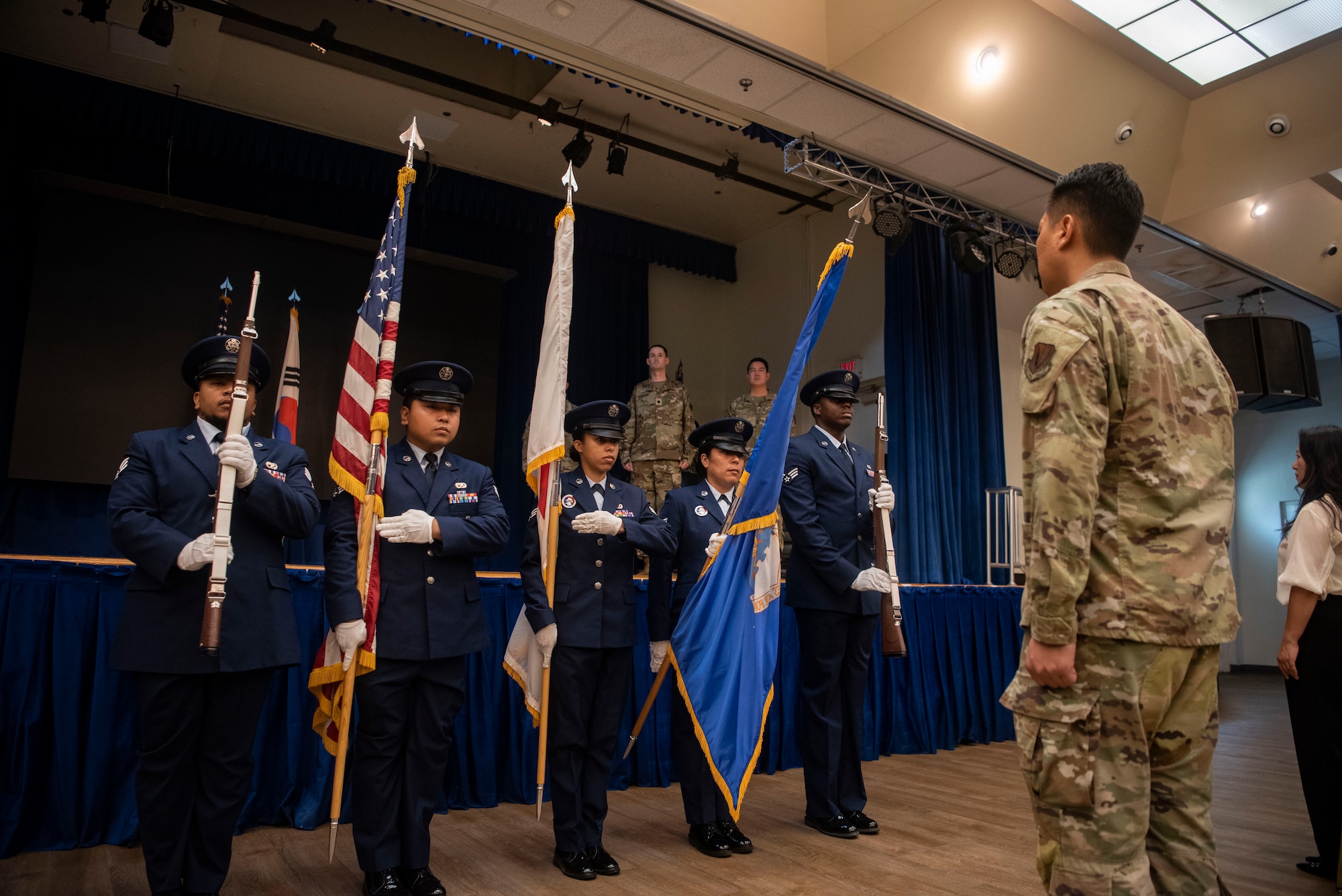 U.S. Air Force service members assigned to the 51st Fighter Wing Honor Guard, present the colors during the 694th Intelligence Support Squadron Change of Command ceremony at Osan Air Base, Republic of Korea, July 8, 2025