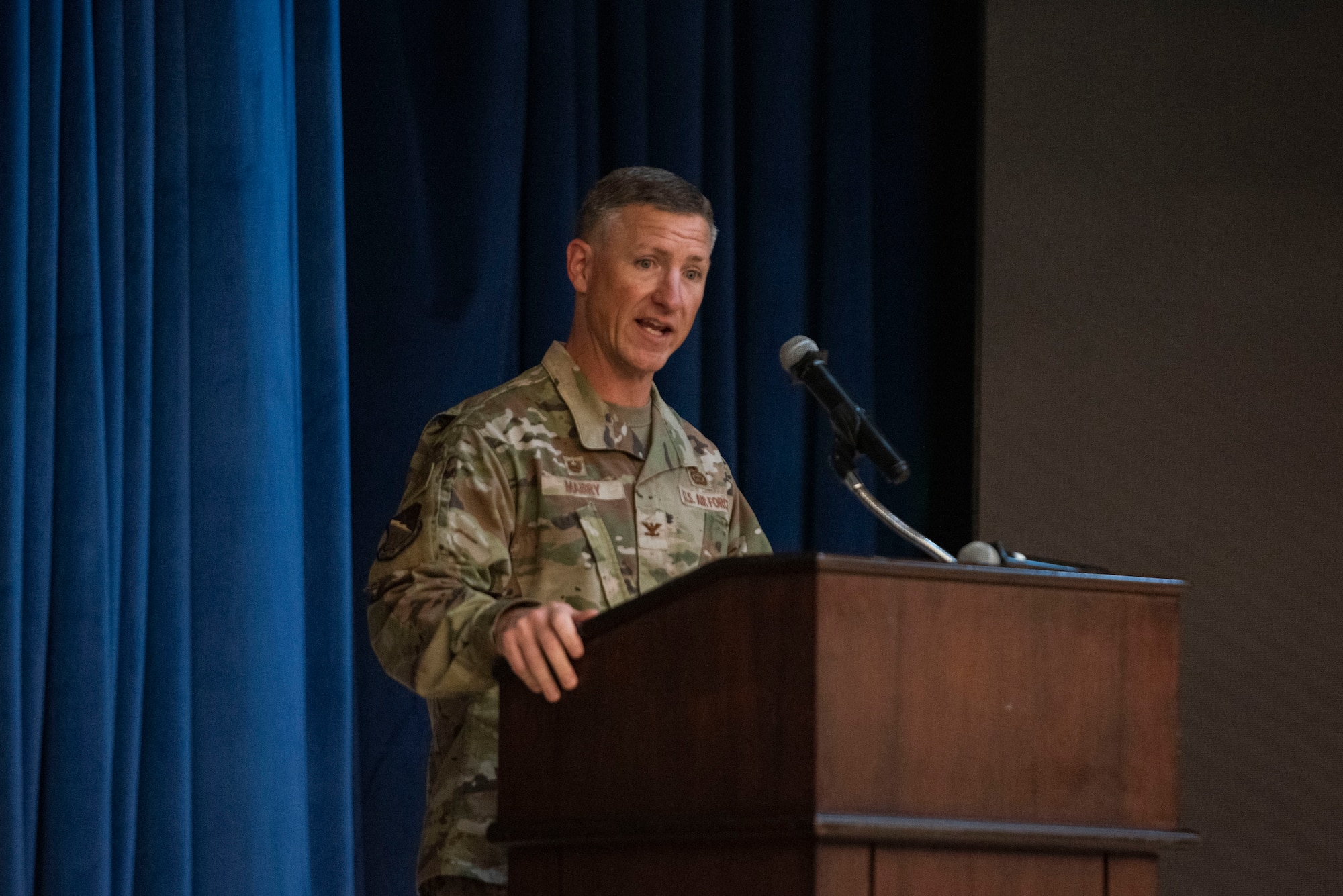 U.S. Air Force Col. Douglas Mabry, 694th Intelligence, Surveillance, and Reconnaissance Group commander, provides opening remarks as the presiding officer during the 694th Intelligence Support Squadron Change of Command ceremony at Osan Air Base, Republic of Korea, July 8, 2025.