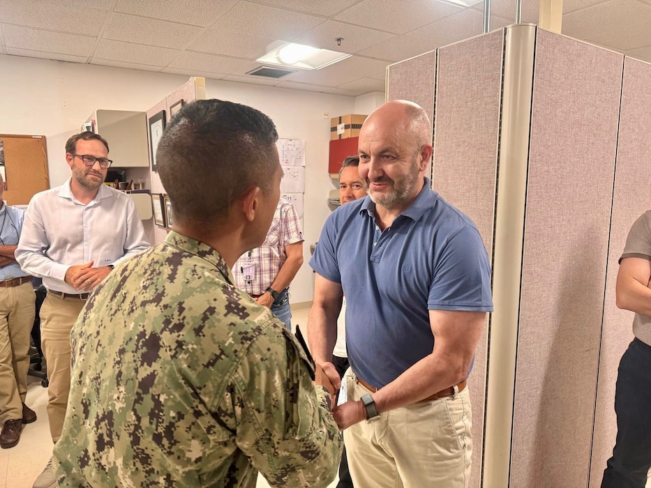 250602-N-FT324-6828. ROTA, SPAIN (June 2, 2025). Mr. Jeffrey Rogers, Information System Security Manager, was recognized by U.S. Naval Hospital Rota, Commanding Officer Captain Michael G. Mercado, for earning the highest cybersecurity compliance rating, Maturity Level 4. This recognition highlights the Information Management Department (IMD) team's dedication and expertise in safeguarding the hospital’s digital infrastructure and ensuring mission readiness. (U.S. Navy Photo Released by Lt. Cmdr. Alicia Sacks)
