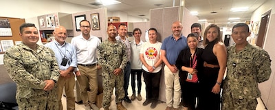 250602-N-FT324-8398. ROTA, SPAIN (June 2, 2025). The Information Management Department (IMD) team at U.S. Naval Hospital Rota was recognized by U.S. Naval Hospital Rota, Commanding Officer Captain Michael G. Mercado, for earning the highest cybersecurity compliance rating, Maturity Level 4. Their dedication and expertise play a vital role in safeguarding the hospital’s digital infrastructure and supporting mission readiness. (U.S. Navy Photo Released by Lt. Cmdr. Alicia Sacks)
