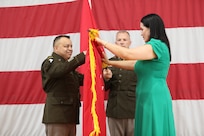 Brig. Gen. Jorge M. Fonseca and his wife, Andrea Fonseca, unfurl his one-star flag during his promotion ceremony June 21, 2025, at the Kedzie Armory in Chicago, as Command Sgt. Maj. Michael R. Kelly, State Command Sergeant Major of the Illinois Army National Guard, looks on. The ceremony marked Fonseca’s promotion to brigadier general and his appointment as Director of the Joint Staff.
(U.S. Army photo by 2nd Lt. Trenton Fouche, Joint Force Headquarters – Illinois National Guard)