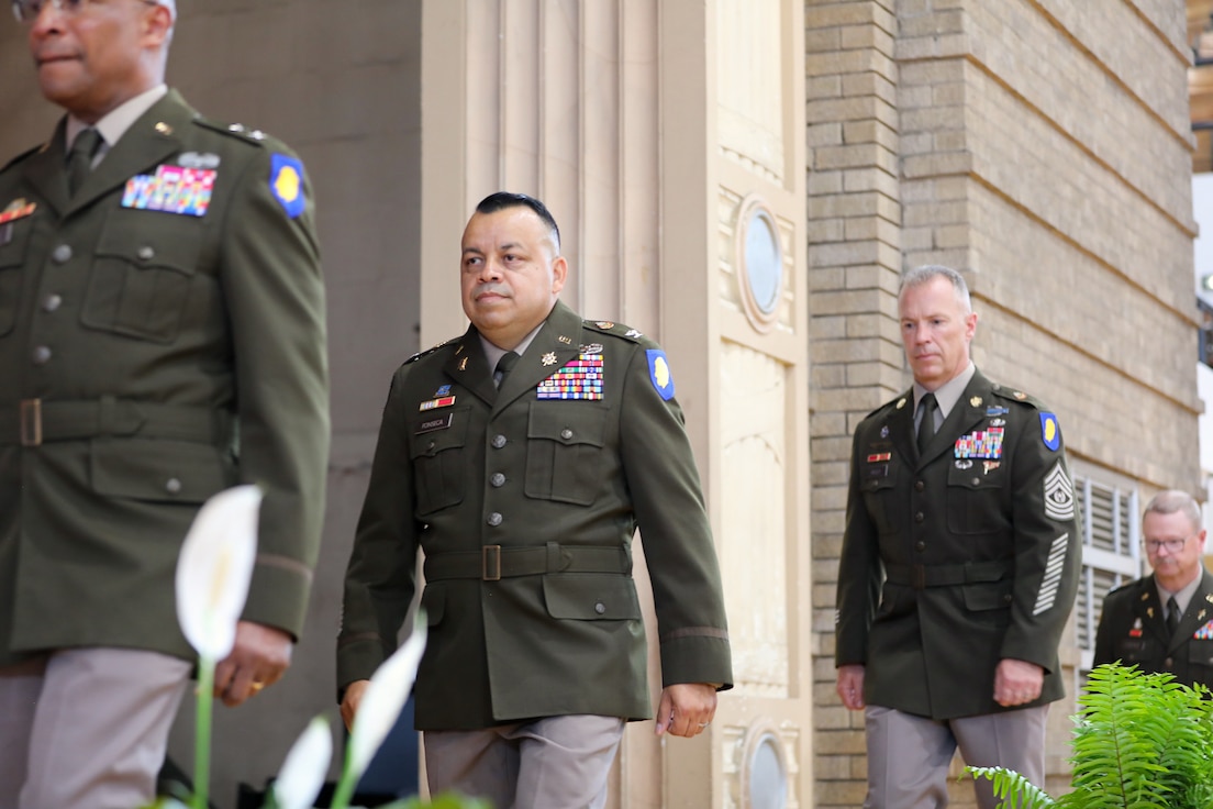 Brig. Gen. Jorge M. Fonseca, newly appointed Director of the Joint Staff for the Illinois National Guard, enters the auditorium for his promotion ceremony June 21, 2025, at the Kedzie Armory in Chicago. Fonseca, a native of Chicago’s Little Village and a veteran of Iraq and Afghanistan, was promoted during a ceremony attended by family, friends, and fellow service members.
(U.S. Army photo by 2nd Lt. Trenton Fouche, Joint Force Headquarters – Illinois National Guard)