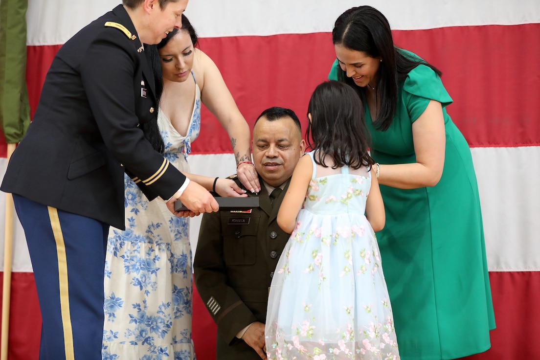 Brig. Gen. Jorge M. Fonseca is pinned by his wife, Andrea Fonseca, and one of their daughters during his promotion ceremony June 21, 2025, at the Kedzie Armory in Chicago. Fonseca, a native of Chicago’s Little Village, was promoted to brigadier general and appointed Director of the Joint Staff for the Illinois National Guard.
(U.S. Army photo by 2nd Lt. Trenton Fouche, Joint Force Headquarters – Illinois National Guard)