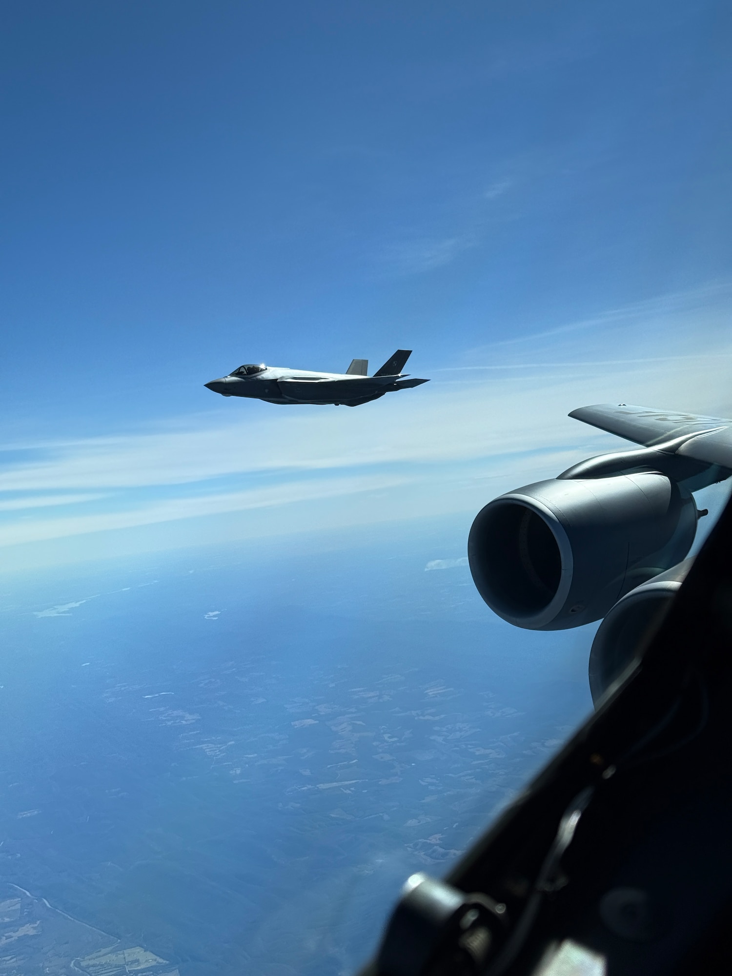 A Polish F-35 flies along with a KC-135