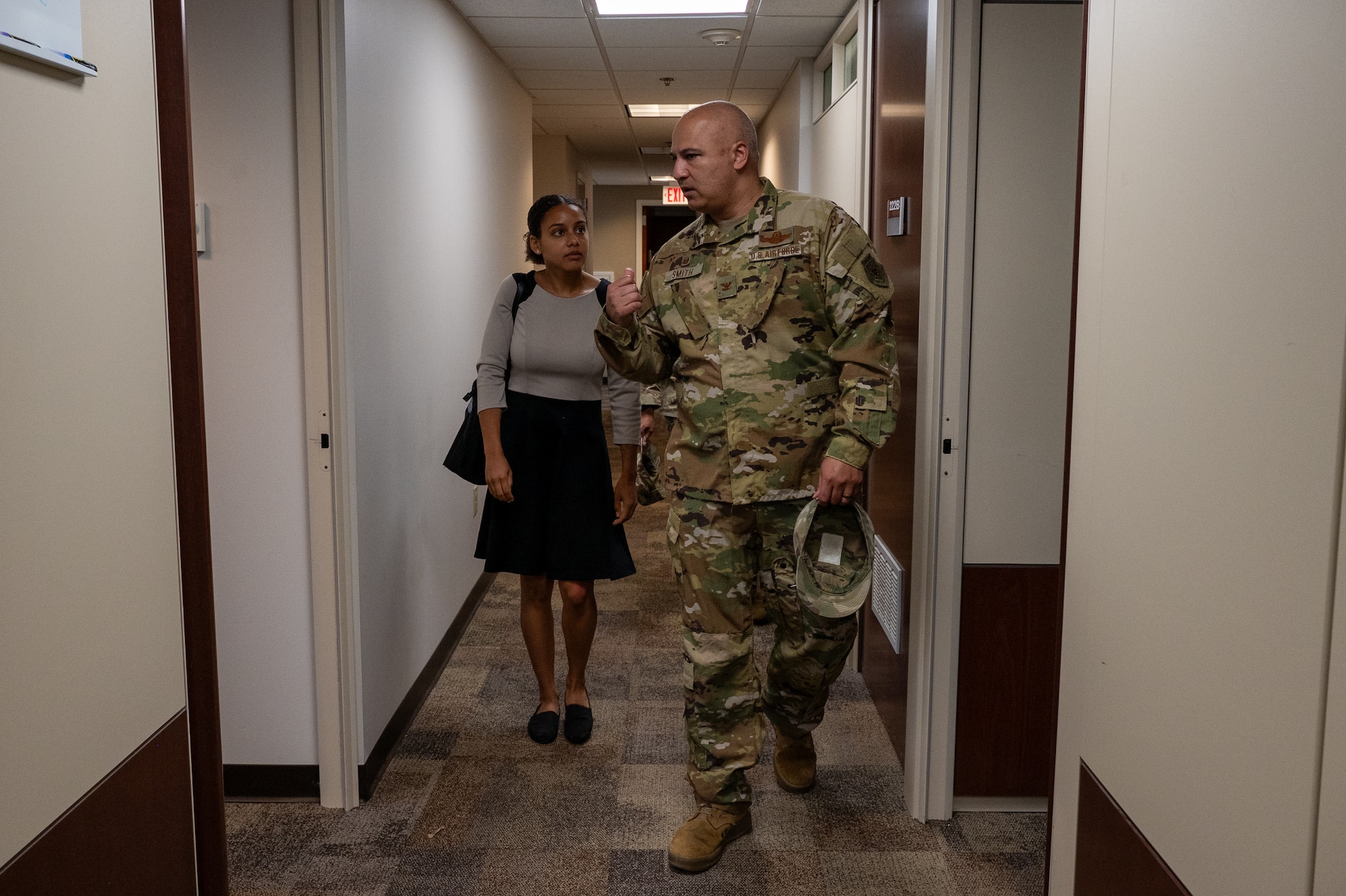 Col. Jeffrey Smith, 932nd Airlift Wing commander, escorts Jenn Atanasov, Office of the Senator Tammy Duckworth metro east community outreach coordinator, through the 932nd AW headquarters building, Scott AFB, Illinois, June 11, 2025.  Smith advocated hot topics affecting the AF Reserve, such as recruiting and retention, aircraft modernization and National Guard and Reserve Equipment Appropriation (NGREA), and Fiscal Year 2026 Air Force Reserve legislative priorities, such as TRICARE Reserve Select for Air Reserve Technicians (ART).