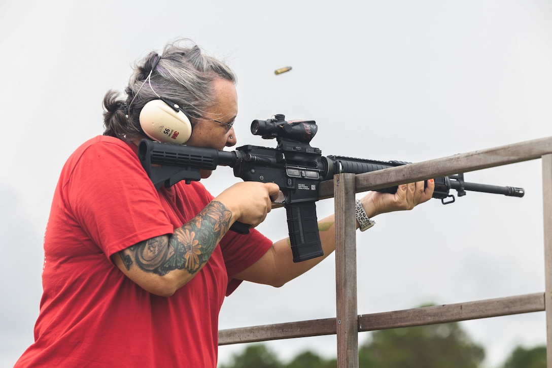 Educators from Ohio and Kentucky fire M16A4 service rifles on a live-fire range during Educators Workshop at Marine Corps Recruit Depot Parris Island, South Carolina, June 12, 2025. Educators Workshop provides an opportunity for high school teachers and school administrators to experience and gain insight into some of the challenges recruits face during Marine Corps recruit training. Attendees of the workshop can inform their students about the benefits and opportunities the Marine Corps can provide. (U.S. Marine Corps photo by Lance Cpl. Allegra Catalan-Dyson).