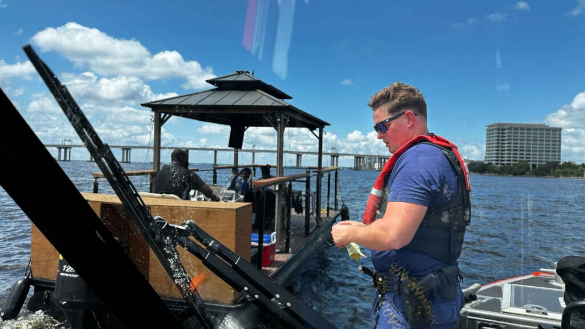 A U.S. Coast Guard Station Mayport boat crew terminates the voyage of an illegal charter vessel operating on the St. Johns River in Jacksonville, Florida, July 4, 2025.