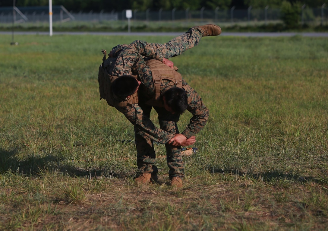 U.S. Marines conduct a Marine Corps Martial Arts Program (MCMAP) course at Atlantic Alliance '25 (AA25) on July 6, 2025.

AA25 maintains Marine Corps capabilities while implementing ground support training such as MCMAP qualifications.

(U.S. Marine Corps photo by LCpl. Kenneth Lambert)