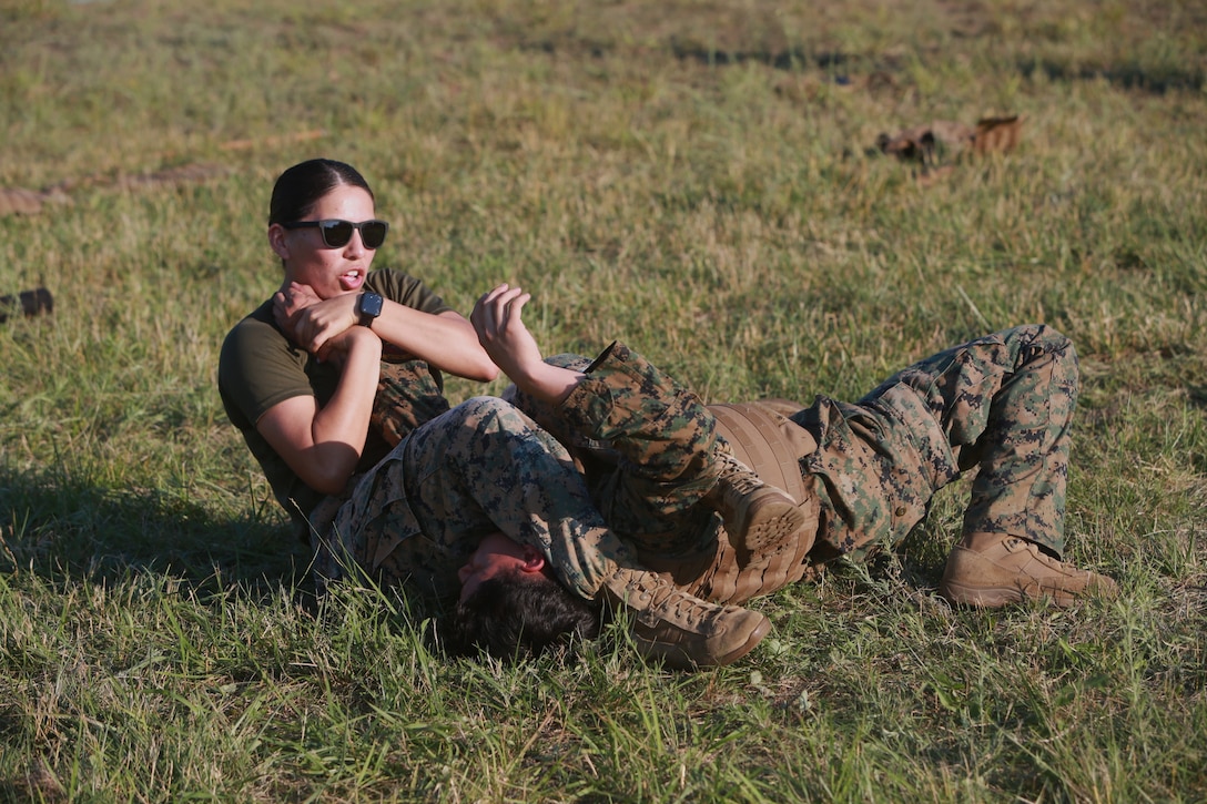U.S. Marine Corps Capt. Maira Ramirez (left) and Cpl. Nicholas Rocha (right) conducts an arm-bar technique during a Marine Corps Martial Arts Program (MCMAP) course at Atlantic Alliance '25 (AA25) on July 6, 2025.

AA25 maintains Marine Corps capabilities while implementing ground support training such as MCMAP qualifications.

(U.S. Marine Corps photo by LCpl. Kenneth Lambert)