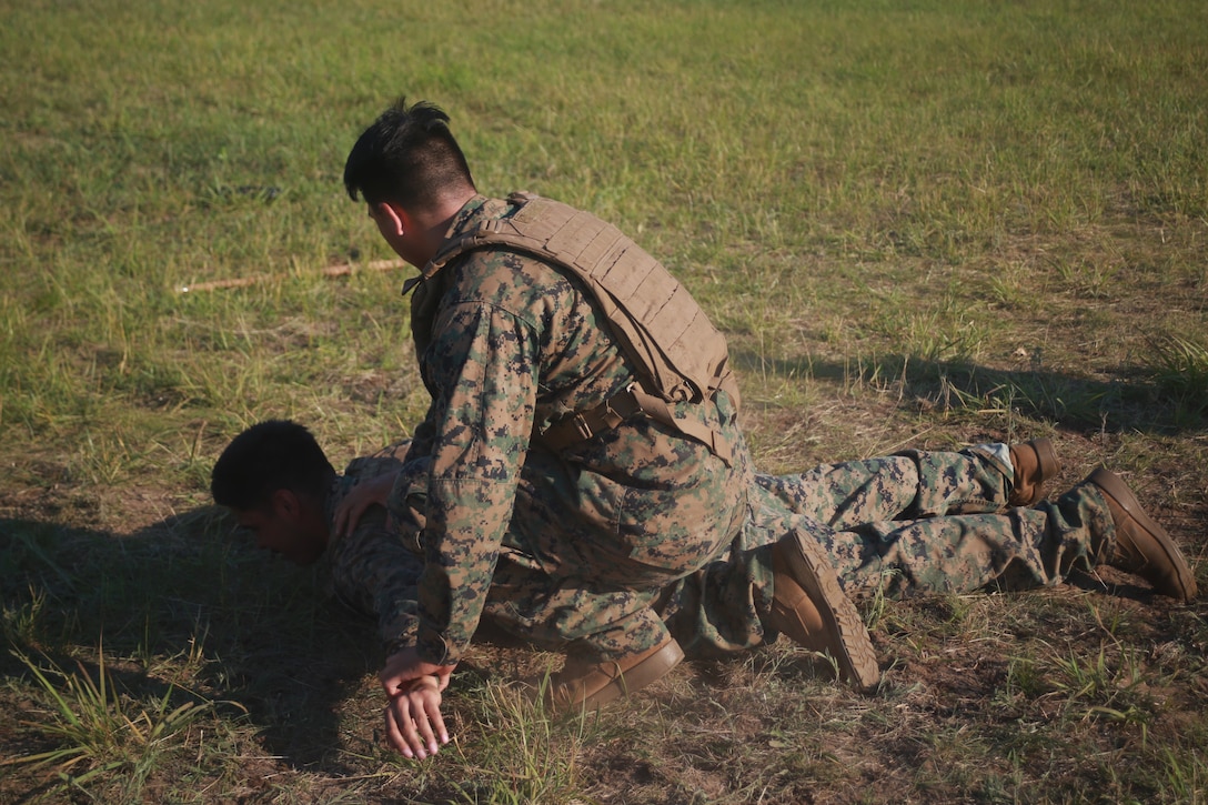 U.S. Marine Corps LCpl. Keanan Allen (top) and LCpl. Louis Samano (bottom) conduct a Marine Corps Martial Arts Program (MCMAP) course at Atlantic Alliance '25 (AA25) on July 6, 2025.

AA25 maintains Marine Corps capabilities while implementing ground support training such as MCMAP qualifications.

(U.S. Marine Corps photo by LCpl. Kenneth Lambert)