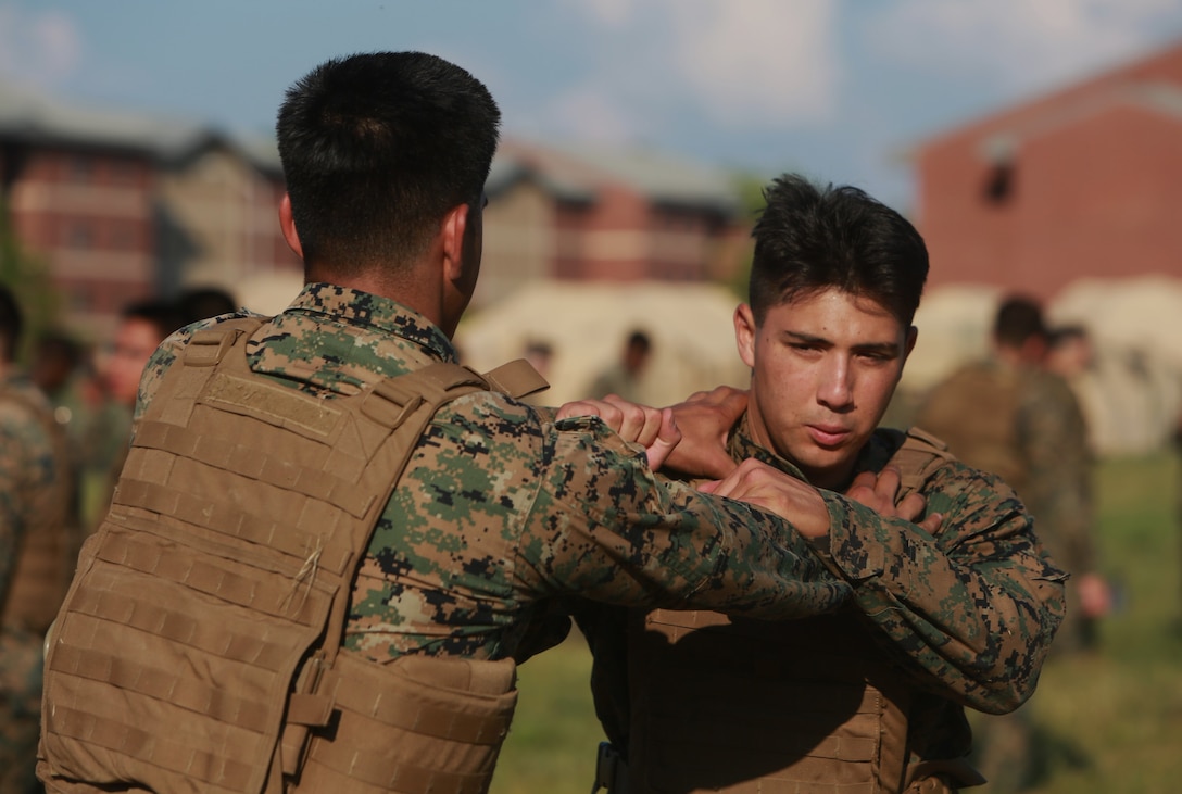 U.S. Marine Corps Capt. Maira Ramirez (left) and Cpl. Nicholas Rocha (right) conducts an arm-bar technique during a Marine Corps Martial Arts Program (MCMAP) course at Atlantic Alliance '25 (AA25) on July 6, 2025.

AA25 maintains Marine Corps capabilities while implementing ground support training such as MCMAP qualifications.

(U.S. Marine Corps photo by LCpl. Kenneth Lambert)