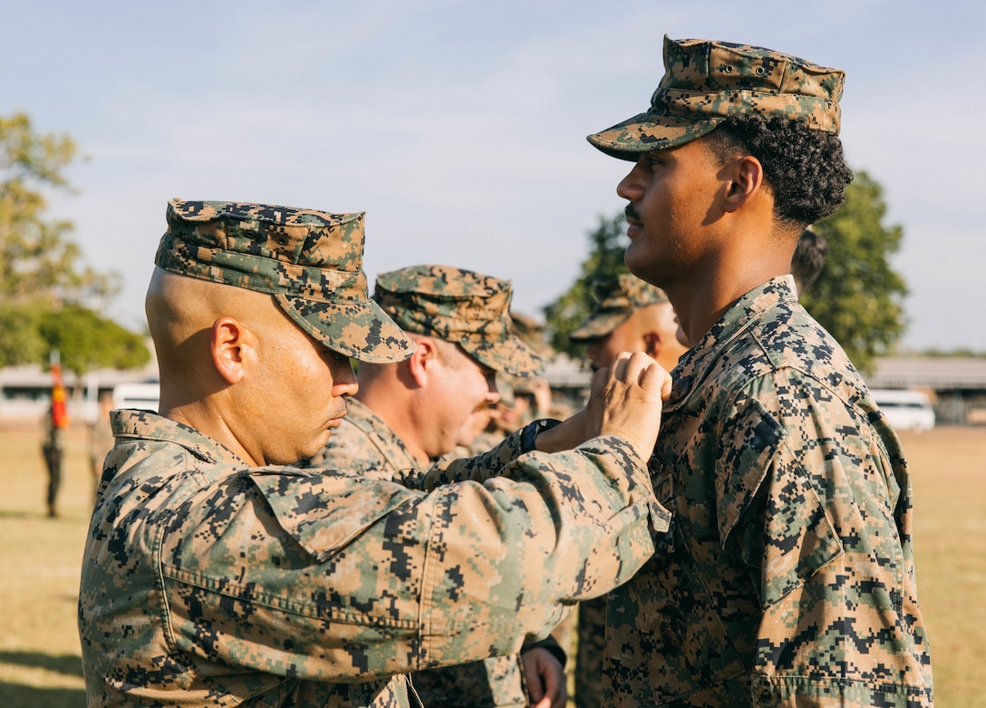 U.S. Navy sailors with Combat Logistics Battalion 1, Marine Rotational Force – Darwin 25.3, are pinned during a Fleet Marine Force pinning ceremony at Robertson Barracks, Darwin, Australia, July 3, 2025.