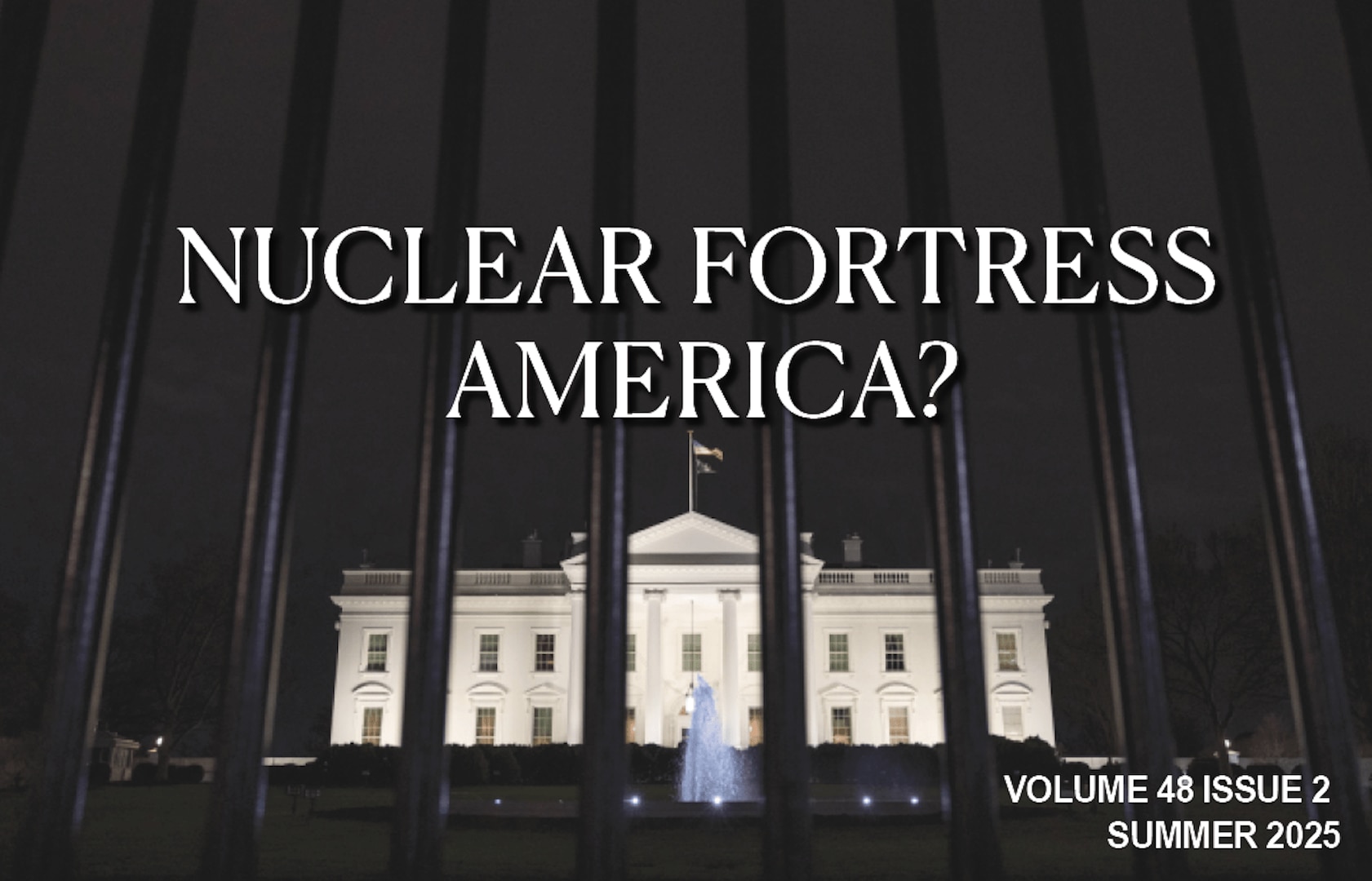 The White House is pictured behind a large-scale fence at night.